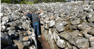 Group inside chambered cairn at Clava